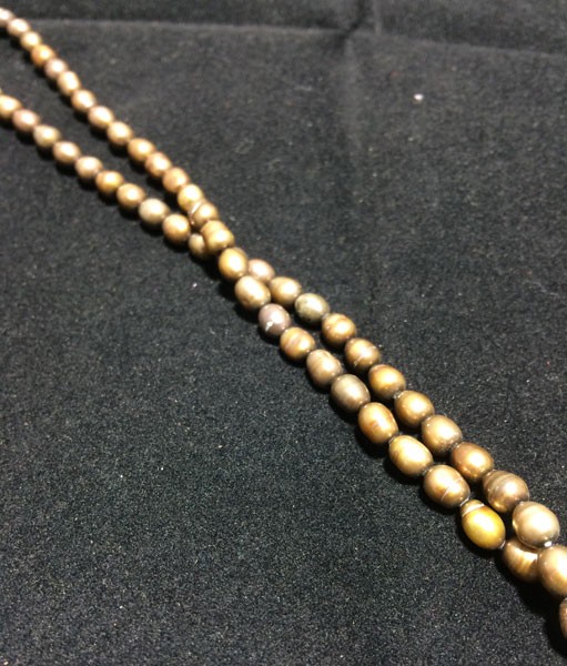 Perla ovalada color dorada, 4mm