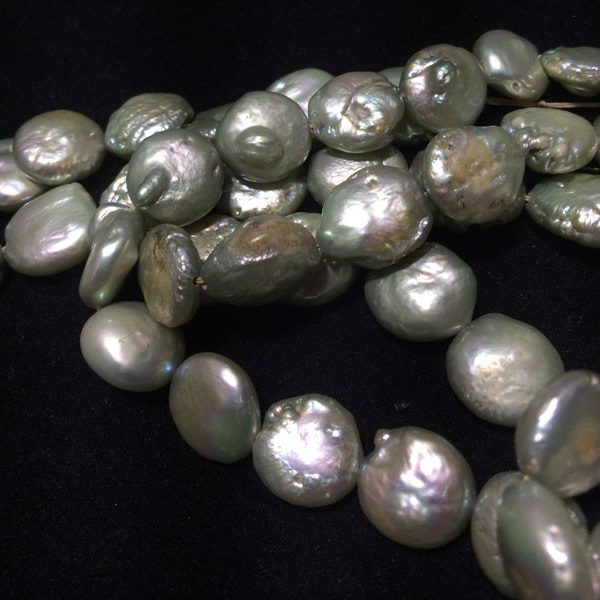 Perla ovalada color verde claro, 9mm