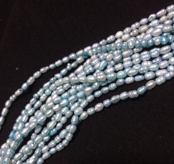 Perla ovalada color azul, 2mm