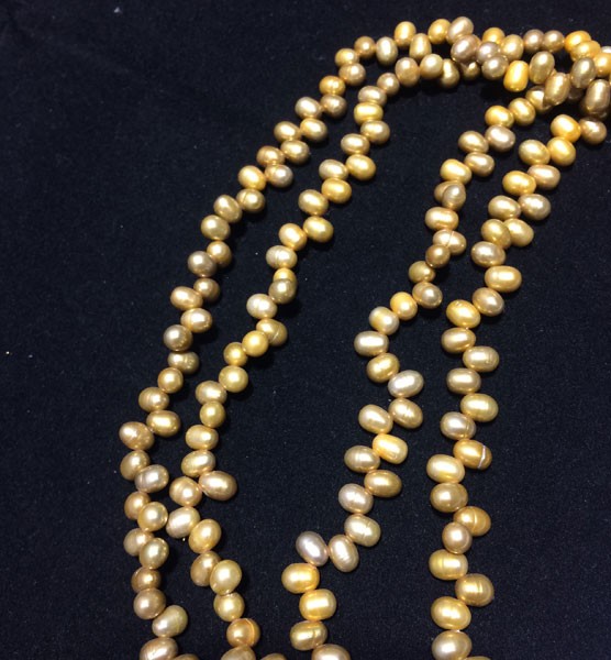 Perla ovalada color mostaza, 5mm