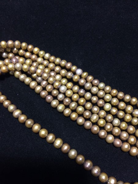 Perla ovalada color café, 4mm