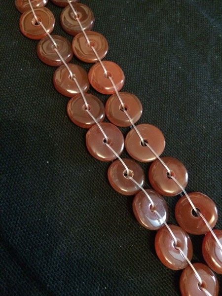 Piedra agata con forma coin lisa de color roja, 10x4