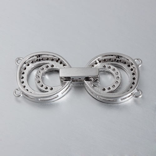 BROCHE FORMA LAZO DOS VUELTAS CON CIRCONES