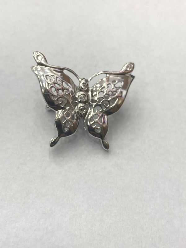 BROCHE MARIPOSA CON IMÁN Y CIRCONES. BROCHE MARIPOSA CON IMÁN Y CIRCONES.